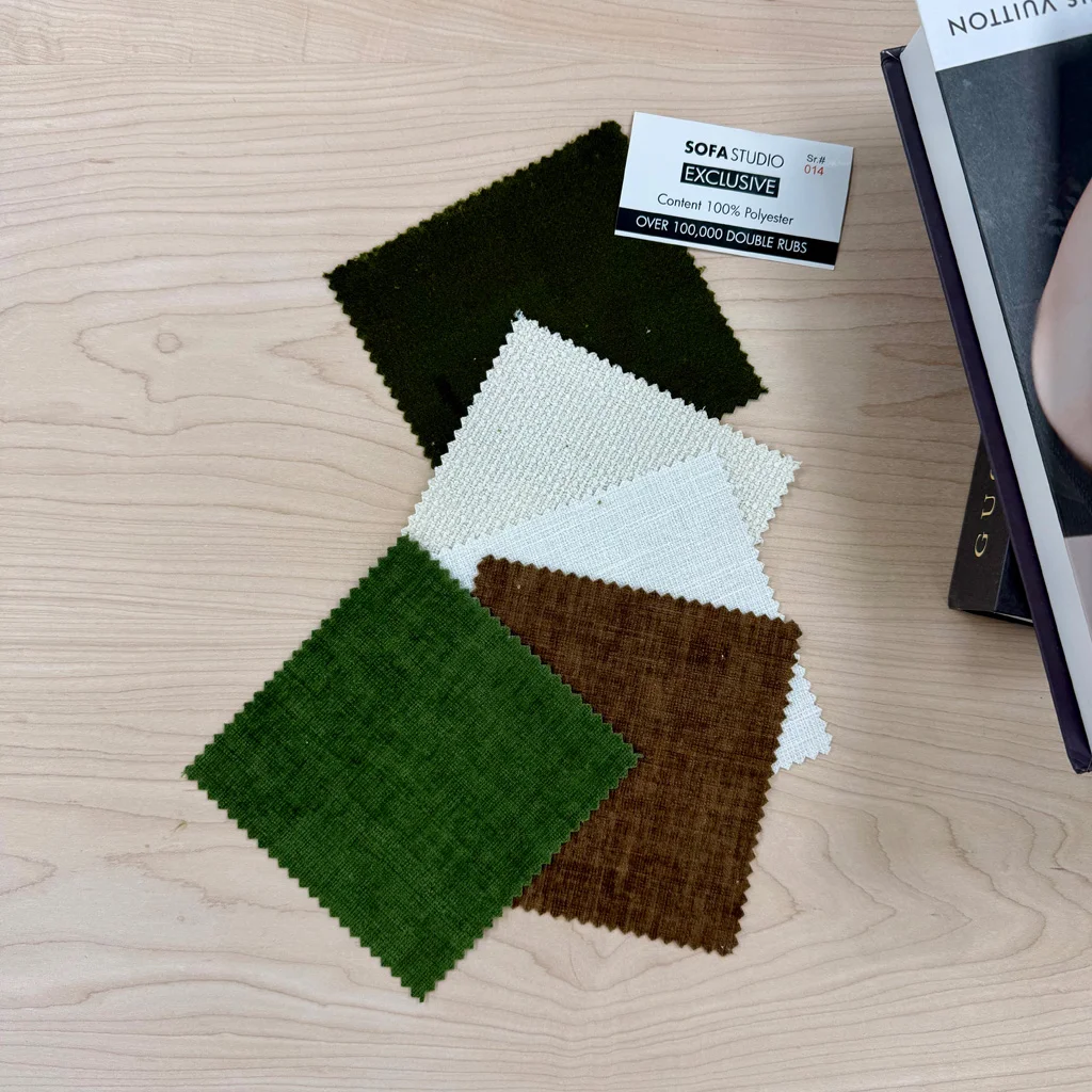 Fabric swatches on a wooden table